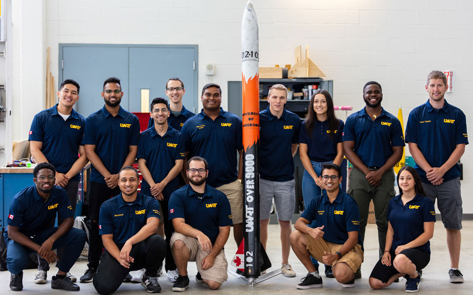 General engineering students posing with their capstone project